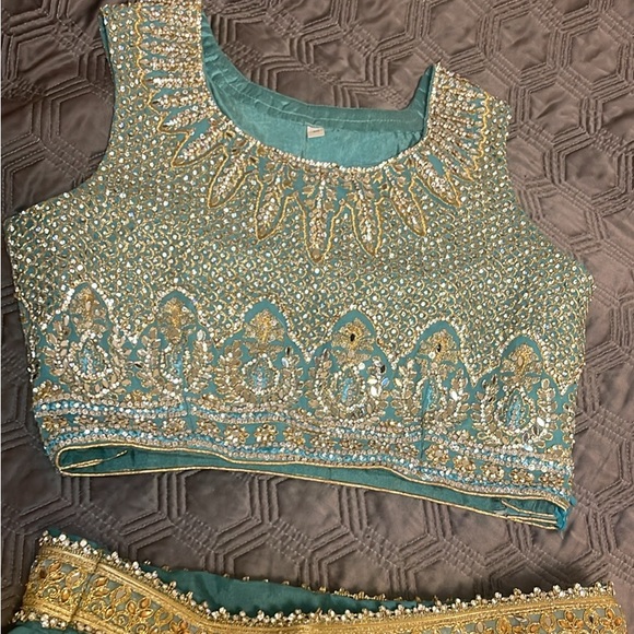 Teal Blue Heavy Lehenga, gold threading with stone and mirror accents - Picture 4 of 9